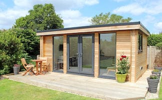 Studio de jardin posé sur dalle bois, déjà monté